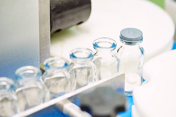 istock machine conveyor with glass bottles ampoules 504275542
