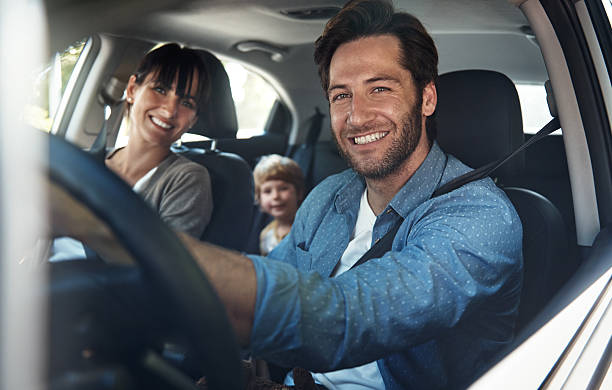 We love our family roadtrips Cropped portrait of a young family on a roadtriphttp://195.154.178.81/DATA/i_collage/pu/shoots/806040.jpg family in car stock pictures, royalty-free photos & images