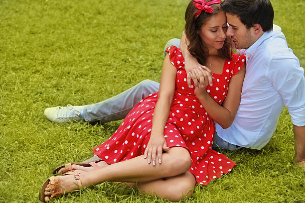 Couple Relaxing  in the park in the summer