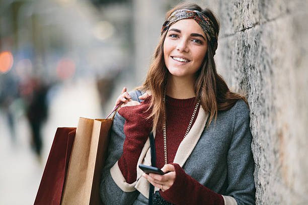 Shopping and texting on a winter day.