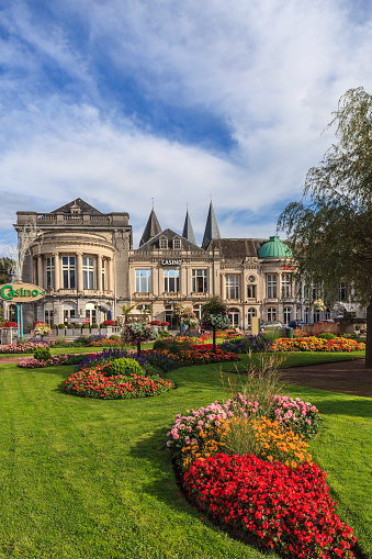 Spa, Belgium - September 19, 2014: The casino of Spa is a building started in 1763 by the prince-bishop of Liege, and is one of the landmarks of the city. It is surrounded by flowered gardens.