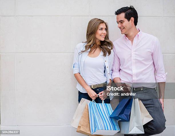 Happy Shopping Couple Stock Photo - Download Image Now - 20-29 Years, Adult, Adults Only