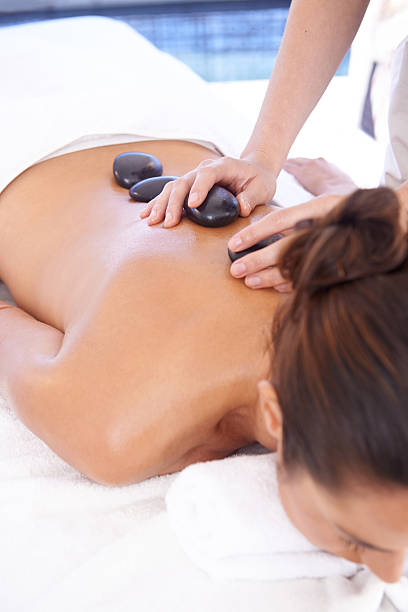istock Spoiling herself with a hot rock treatment at the spa 504286593