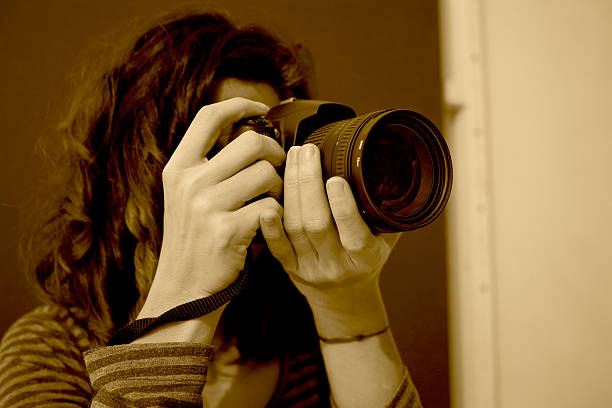istock Woman Photographer Sepia Filter 504287412