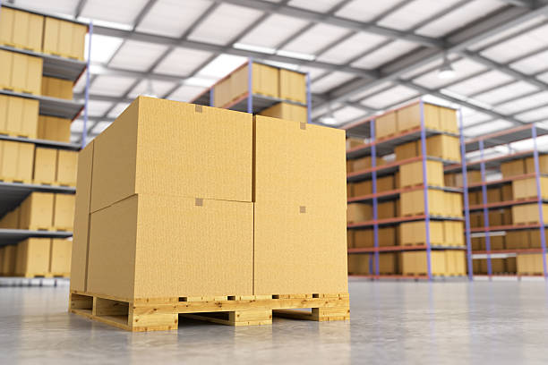 istock Pallet stacked with large cardboard boxes in warehouse 504287900