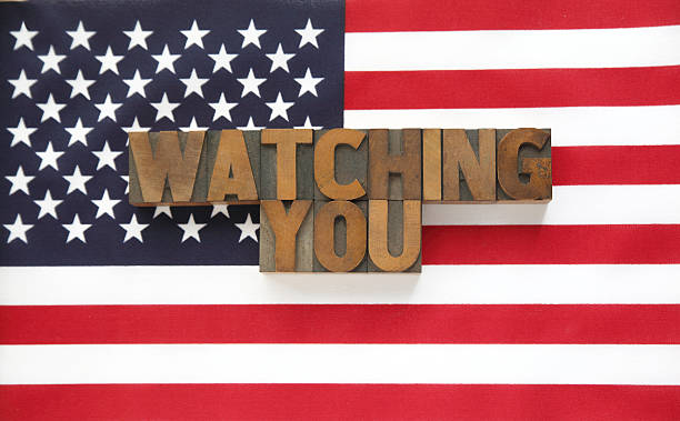 istock watching you in wood type on flag 504288139