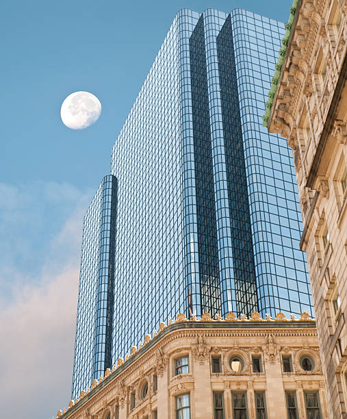 istock skyscrapers and moon 504290261