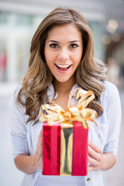 istock Surprised woman with a present 504290767