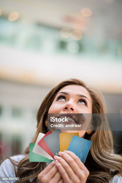 Woman Holding Credit Cards Stock Photo - Download Image Now - 20-29 Years, Adult, Adults Only