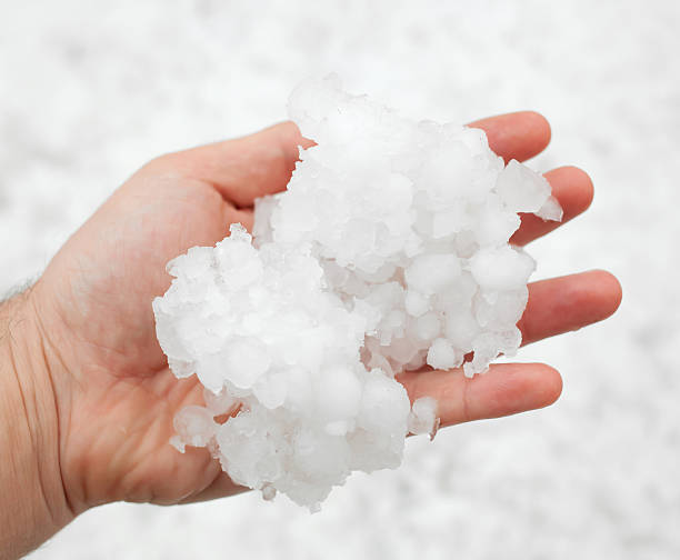 istock Hailstorm in the hand 504292151