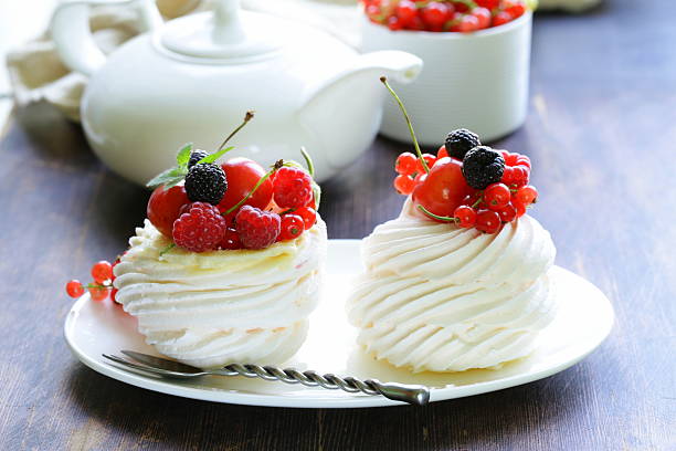 istock traditional summer dessert pavlova with fresh berries 504293531