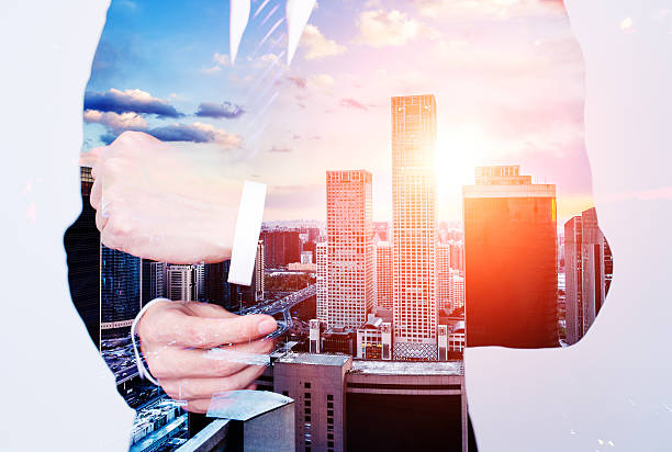 istock businessman superimposed over a cityscape 504304770