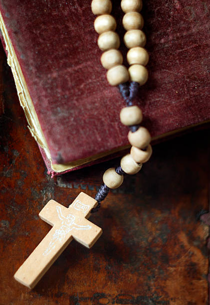 istock wooden beads on old books 504309476