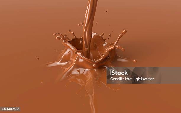 Brown Chocolate Splash With A Crown Stock Photo - Download Image Now - Chocolate, Spray, Splashing