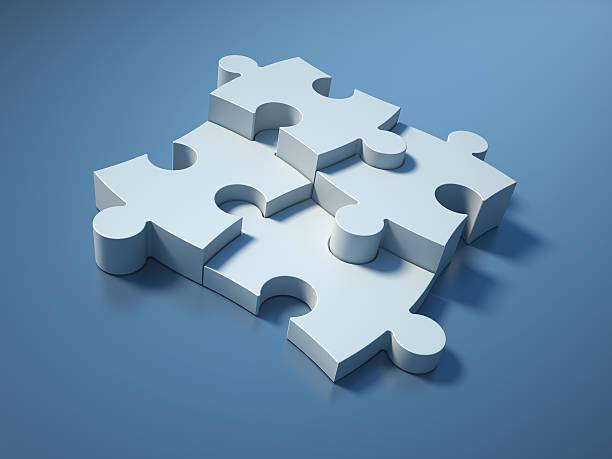 istock Puzzle Jigsaw Pieces on Blue Background 504310402