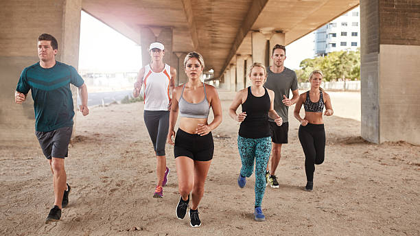 istock Healthy young people running 504310554