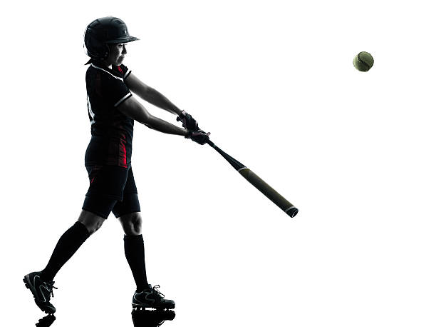 istock woman playing softball players silhouette isolated 504310708