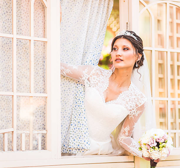 istock Wedding. Beautiful bride with bouquet 504311108