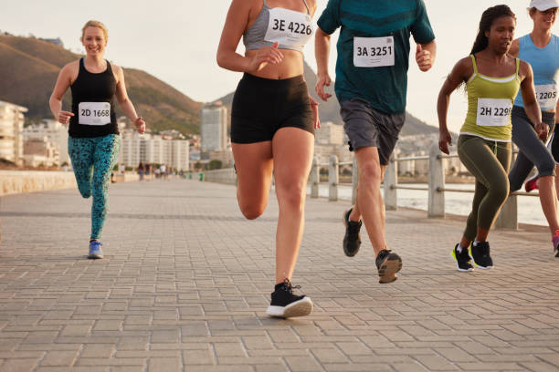 istock Female runners competing in a race 504311126