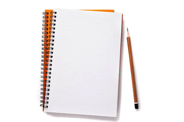 Notebook and pencil isolated on a white background.