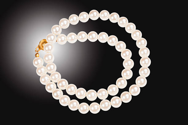 istock Pearl necklace isolated on black 504312766