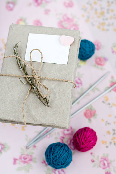 istock Old notebook with dry branch of rosemary for love notes 504313086