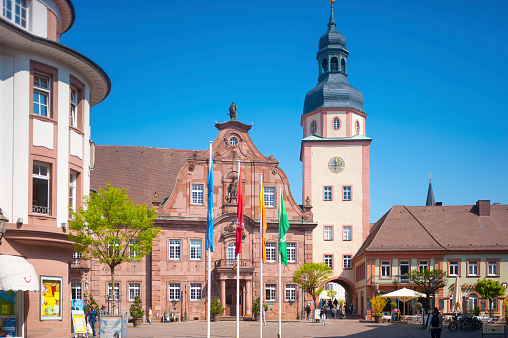 Ettlingen, Germany - April 20, 2009: The Market square with town hall and town hall tower in Ettlingen, Germany, Black Forest, Baden-Wuerttemberg, Germany, Europe