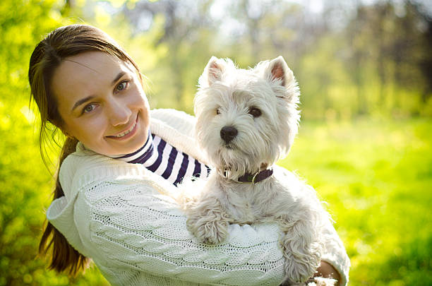 istock woman with dog 504314749