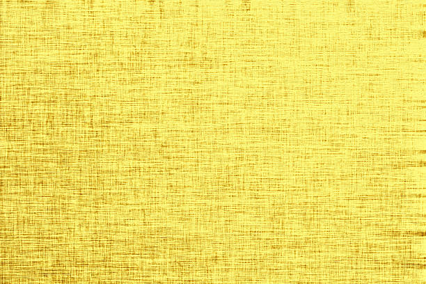 黄色の背景、リネンの質感にゴールドの糸 - gold metal textured textured effect点のイラスト素材／クリップアート素材／マンガ素材／アイコン素材
