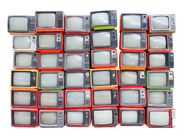 Many old vintage televisions isolated on white with clipping path