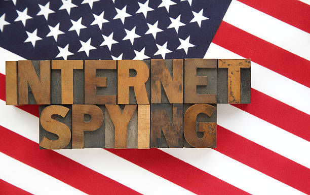 istock internet spying words on American flag 504316447