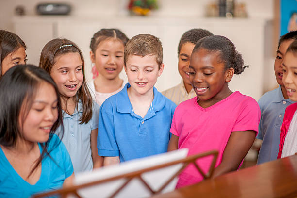 istock Learning a New Song Around the Piano 504316650