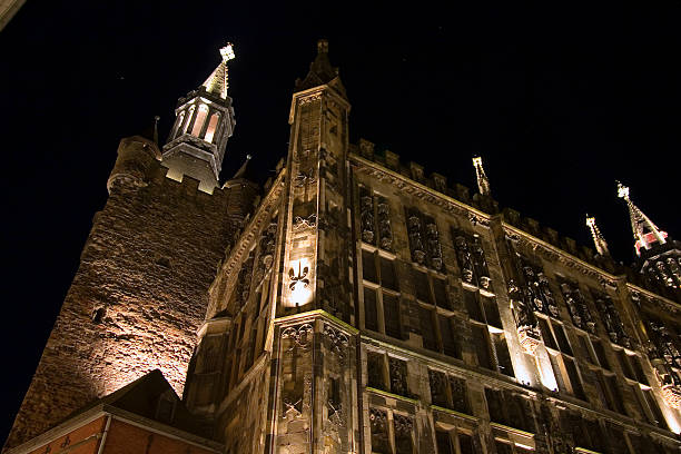 istock City hall of Aachen (Germany) at night 504319687