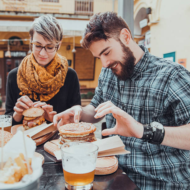 istock Friends In Fast Food Restaurant 504332062