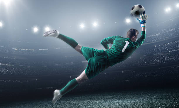 istock Soccer Goalkeeper in a jump 504332262
