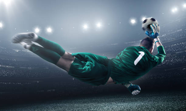 istock Soccer Goalkeeper in a jump 504332462