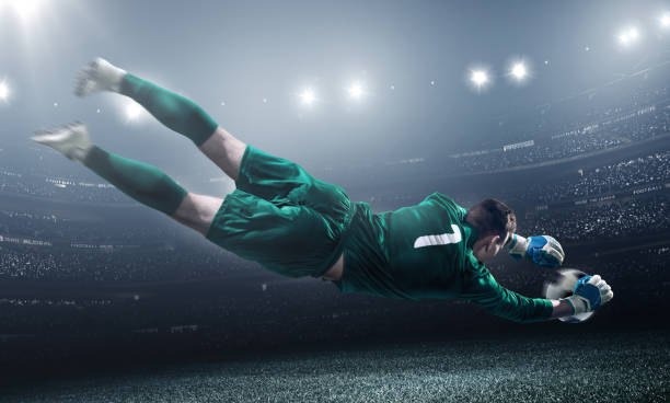 istock Soccer Goalkeeper in a jump 504332704