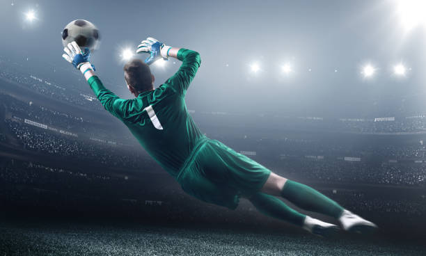 istock Soccer Goalkeeper in a jump 504333474