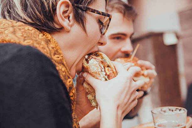 istock Friends In Fast Food Restaurant 504333600