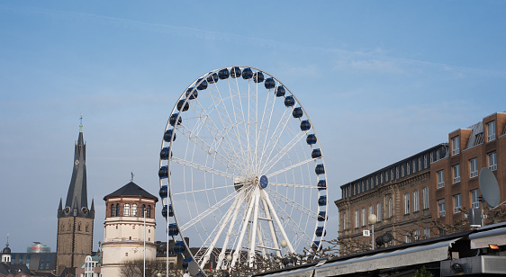 panorama view of ferris wheel in düsseldorf oldtown