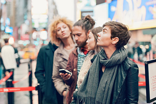 istock Group of people waiting in line 504336294