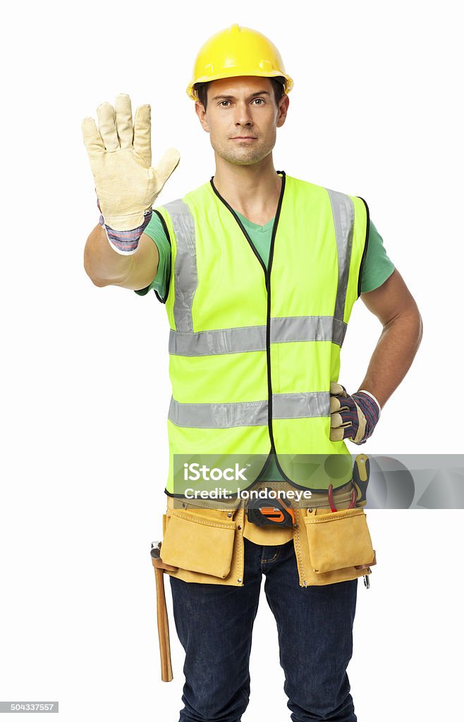 Confiante Trabalhador de Construção balançando um bastão placa de "pare" - Foto de stock de Capacete - Equipamento royalty-free