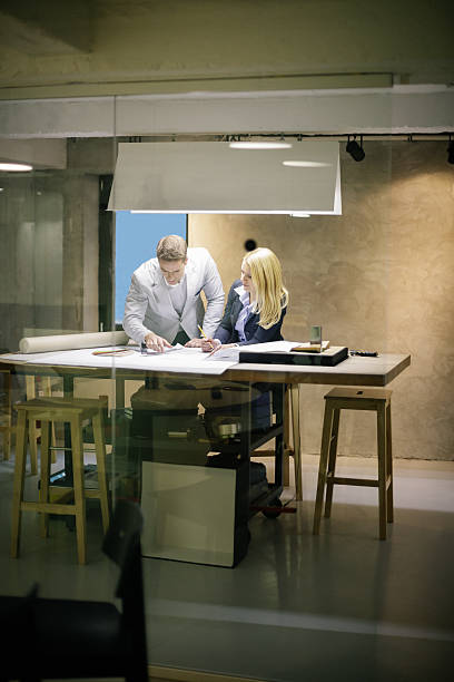 istock Team of architects working on a new business projects 504338678