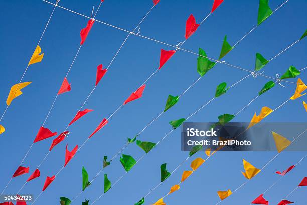 Bunting Colorful Party Flags On A Blue Sky Stock Photo - Download Image Now - Art, Art And Craft, Arts Culture and Entertainment