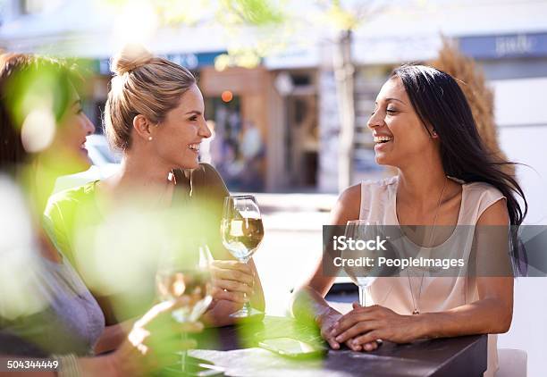 Enjoying A Glass Of Wine With My Best Friends Stock Photo - Download Image Now - Outdoors, Friendship, Bar - Drink Establishment