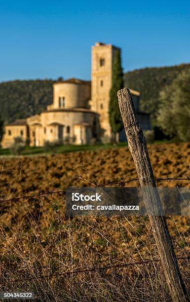 Abbey Of Santantimo Montalcino Tuscany Stock Photo - Download Image Now - Abbazia Di Sant'antimo, Abbey - Monastery, Agricultural Field