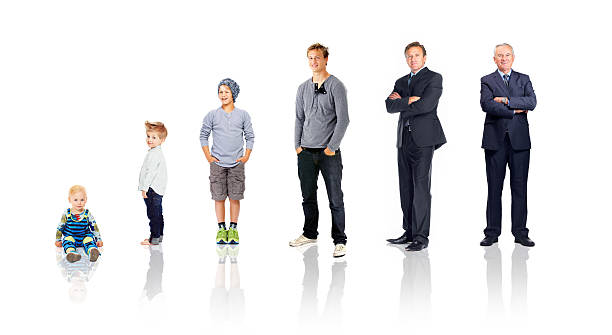 Growth through the years An isolated shot representing stages a man's life from childhood to old age old man baby stock pictures, royalty-free photos & images