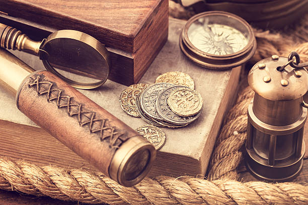 istock Old coins and nautical accessories 504366593