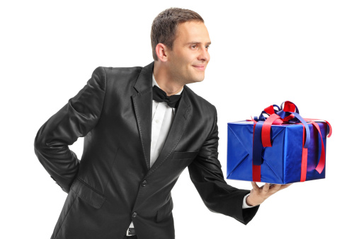 Surprising holiday shopping. Bearded man open present box. Holiday preparation. Holiday sale. Holiday celebration. Christmas and new year. Boxing day. Birthday anniversary. Festive season.