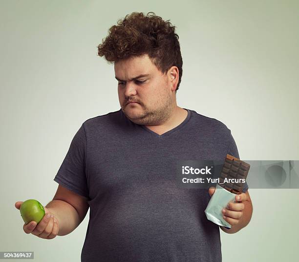 Sorry Mr Apple You Lose This Round Stock Photo - Download Image Now - Contemplation, Men, Dieting